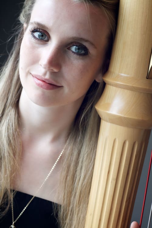 Musician headshot with harp